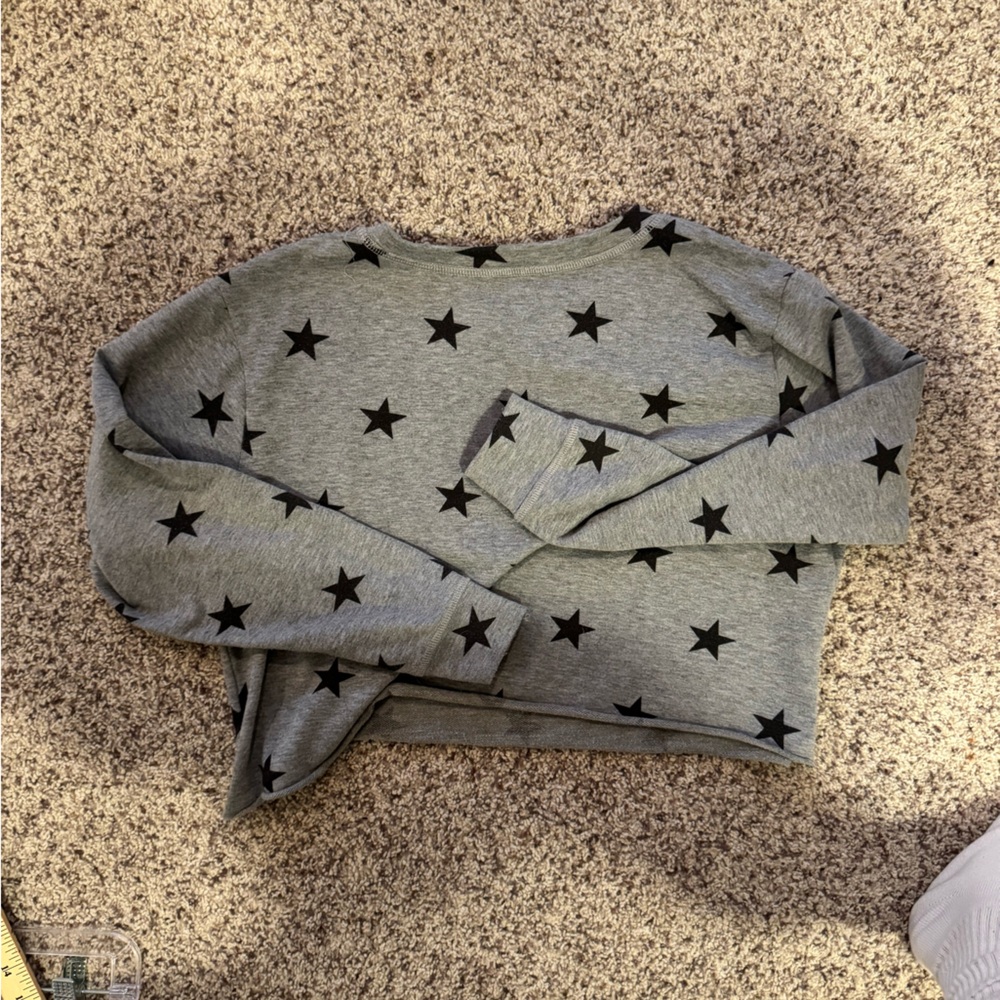 Grey top with black stars